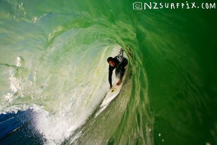 National surfing legend and Raglan local, Daniel Kereopa, locked in at the Ledge, Manu Bay