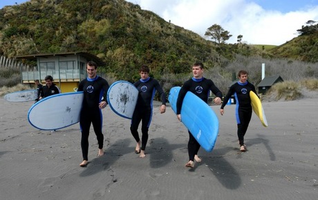 Sam Warburton, Lloyd Williams, Scott Williams and Leigh Halfpenny hit the waves