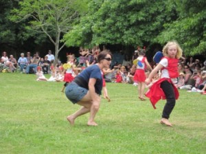 Patti Mitchley joins the performance for a Buzzy Bee sequence