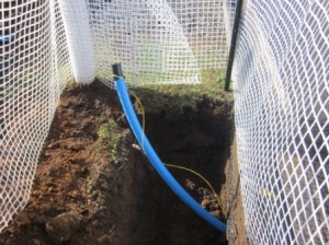 Waiting to be connected, an end of new water pipe in Bayview Road emerges from the ground