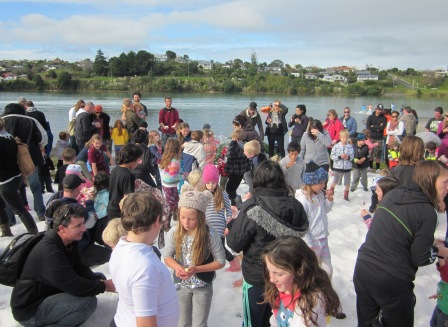 Enjoying snow on the beach at Kopua 23rd June 2012