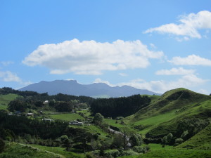 SH 23 winds its way through valleys and hills as it makes its way to Raglan and Mt Karioi.