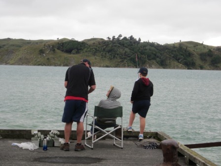 Relaxing with some fishing on Raglan Wharf