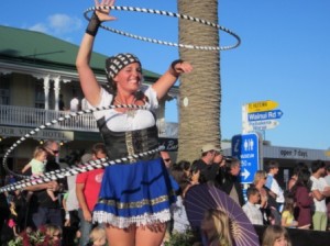 Vicki keeps the hoops going while the float moves along