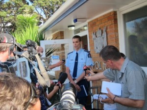 Journalist are briefed on the plane crash search by Inspector Lynam at the Raglan Police Station