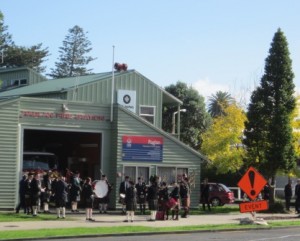 Raglan Pipe Band tunes up outside the Fire Station before the ANZAC parade