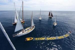 The Flotilla gives the message, "Stop Deep Sea Oil" - Image Greenpeace