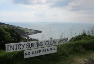 Sign above Manu Bay opposing the deep sea oil drilling off the Raglan Coast