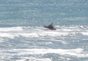 Raglan Coastguard's Gallagher Rescue crosses the Raglan bar. Image NZ Navy