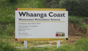 Whaanga Coast Wastewater Scheme sign- now partially completed with 12 properties connected   to it