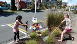 Jordan Mooar and Richina Thy try out some of the tools from the tool library. Image Meridian Energy