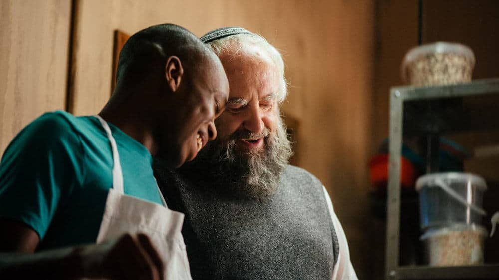 Jonathan Pryce is Nat Dayan, a Jewish bakery owner in London 