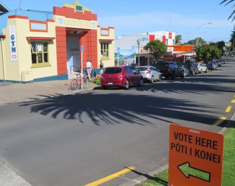 Voters move in and out of the Raglan Town hall as they cast their votes.